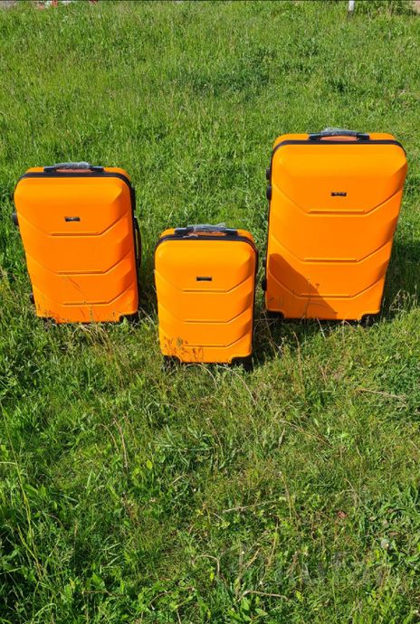 фото чемодан пластиковый оранж 4 колеса 9
