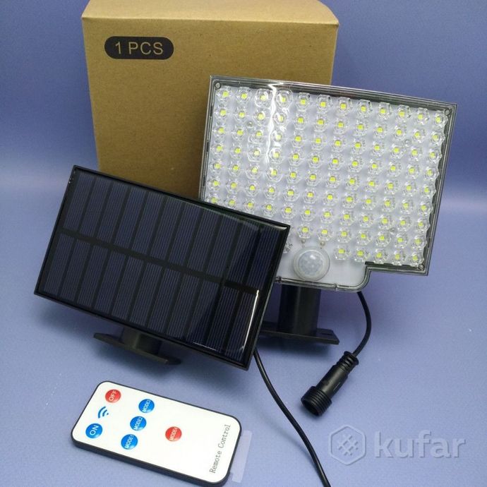 фото светильник - прожектор на солнечной батарее с датчиком движения и пультом управления led solar senso 1