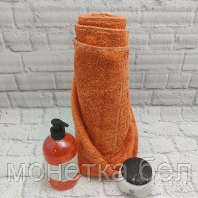 фото полотенце махровое  оптимальный размер, 100 хлопок, 14070см.  морковный 0