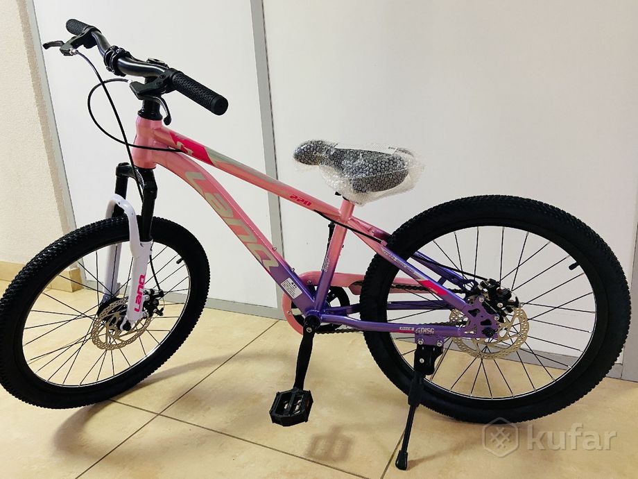 фото велосипед для девочки  lanq 6-10 лет  0