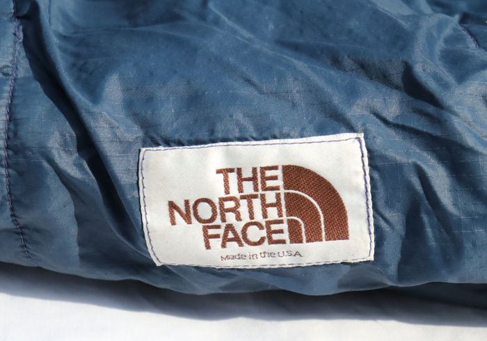 Спальный мешок бренда the north face